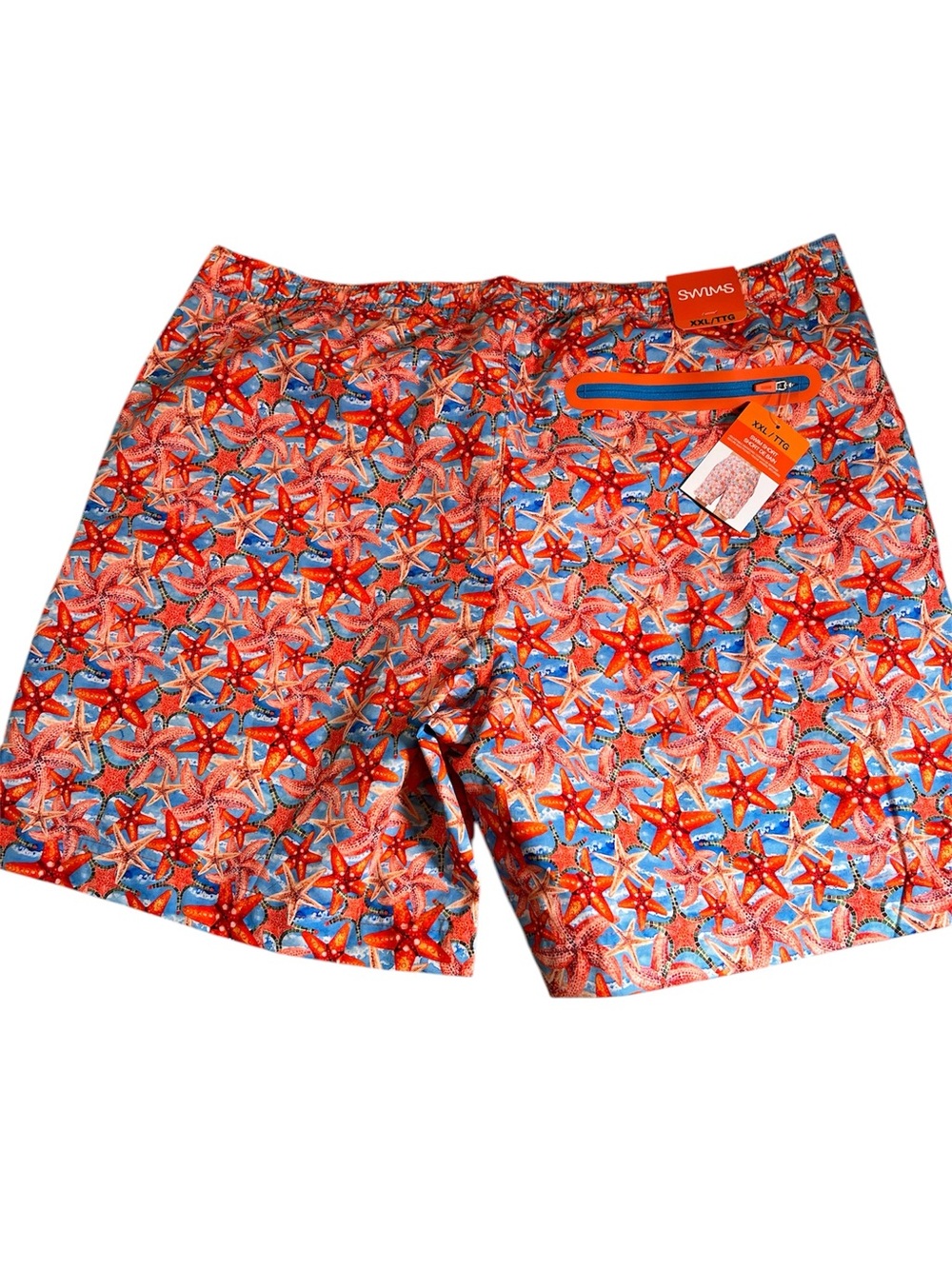 New Swims Men's Orange Starfish Print Swim Trunks. Shorts built in. 
XXL